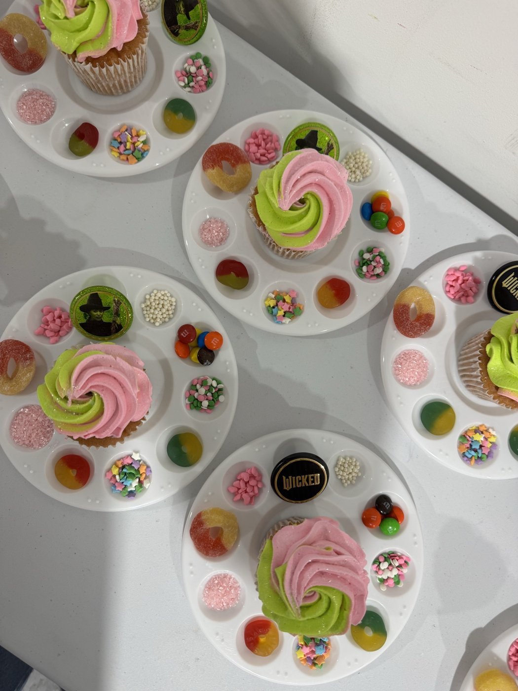 DIY cupcake decorating trays at a Wicked themed party