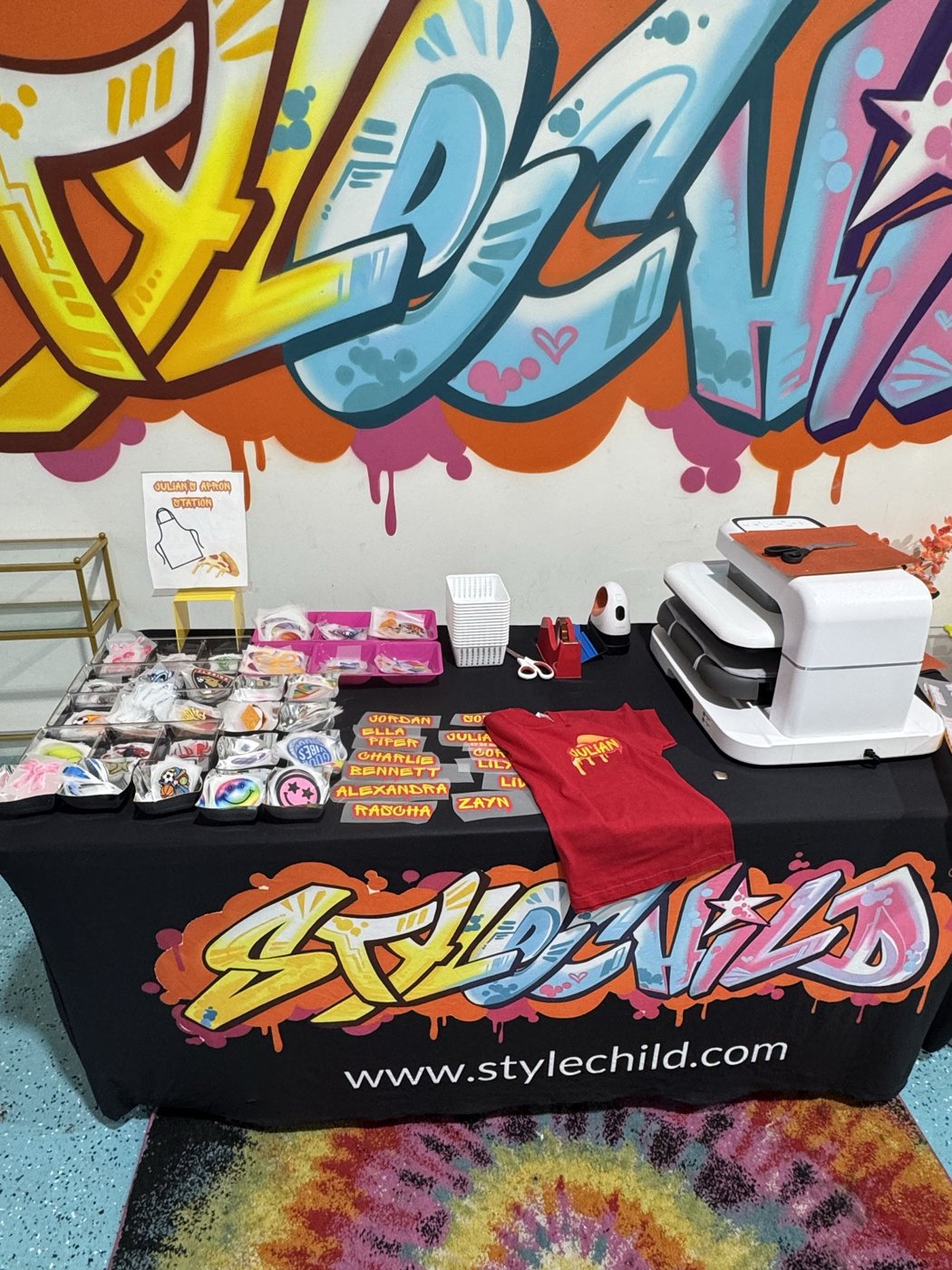 StyleChild heat-transfer booth at an event